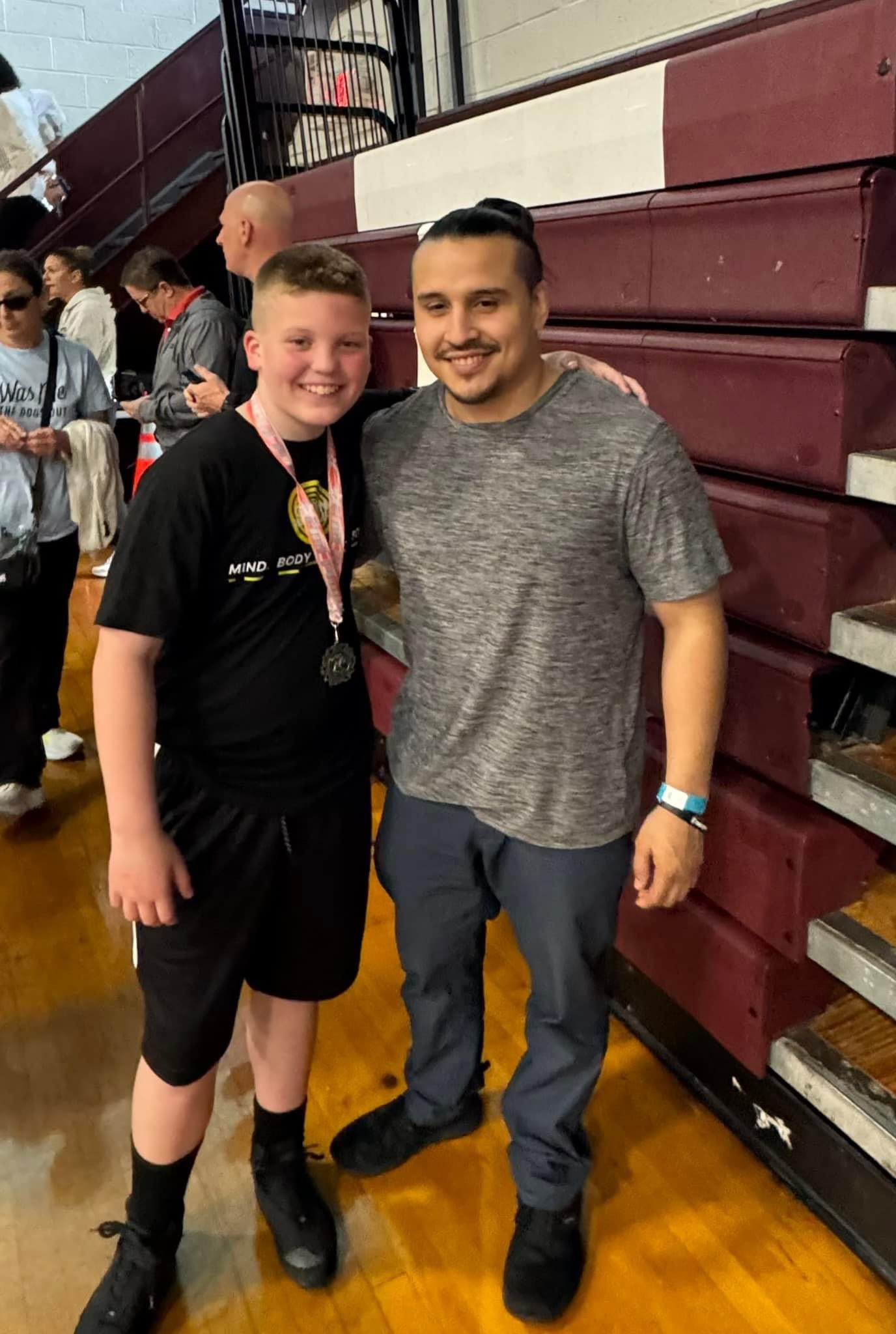 Coach Luis Gonzalez with athlete